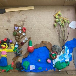 Collaborative clay project #2: Planted trees, container gardens, frogs, small pond, magnifying glass