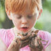 Boy with dirty hands.