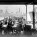 black-and-white image of children learning outside