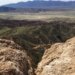 On top of a rocky mountain.